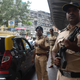 Armed police stand guard on the streets of Mumbai in November 2019 amid heightened tensions over a Supreme Court ruling on holy site contested by Hindus and Muslims.